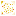 The side of the Golden Carrot Cake texture. It is golden brown with two white frosting layers and scattered golden pixels. There is a gold square at the top left.